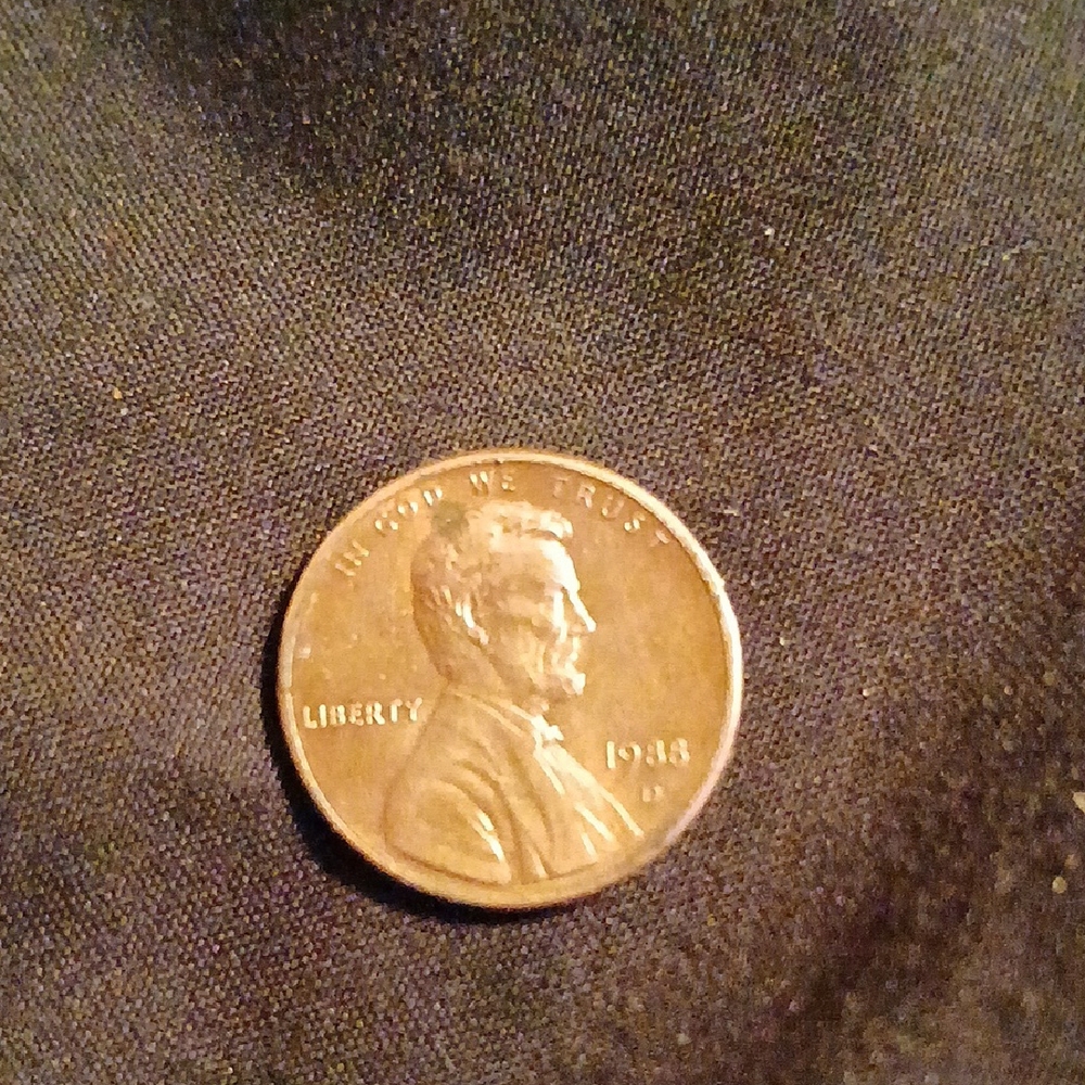 Piko 1988 Copper Coin on Black Fabric